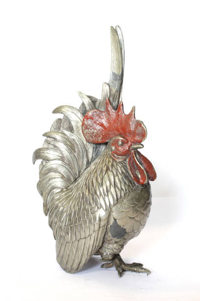 istock A Silver Metal Cockerel Chicken Decoration Figure on White Background 1185222524