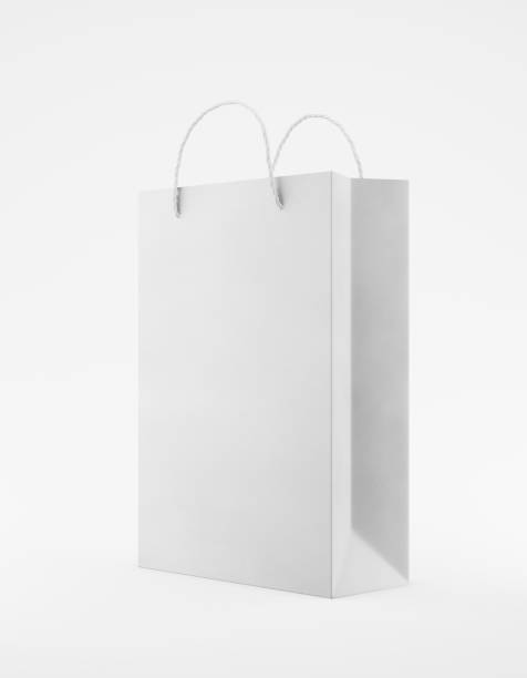 istock Eco packaging mockup bag kraft paper with handle half side. Standart medium white template on white background promotional advertising. 3D rendering 1185223393