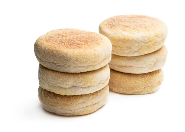 istock Freshly baked English muffins isolated on a white 1185223437
