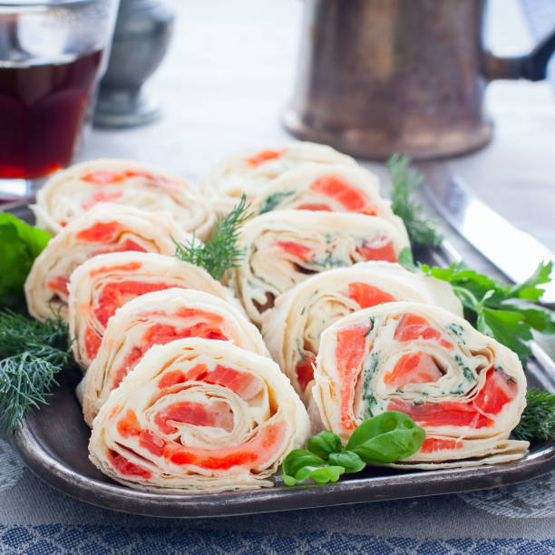 istock Lavash roll with red fish and cheese, square 1185224763