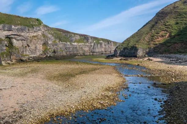 Photo of Entrance to Smoo Cave, a large combined sea and freshwater cave with a waterfall, Durness, Highlands, Scotland.