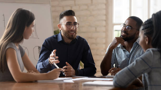 istock Engaged arabian businessman discussing project details with clients. 1185229006