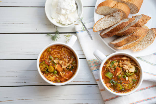 istock Vegan Noodle and Vegetables Soup, in Ceramic Mugs 1185229076