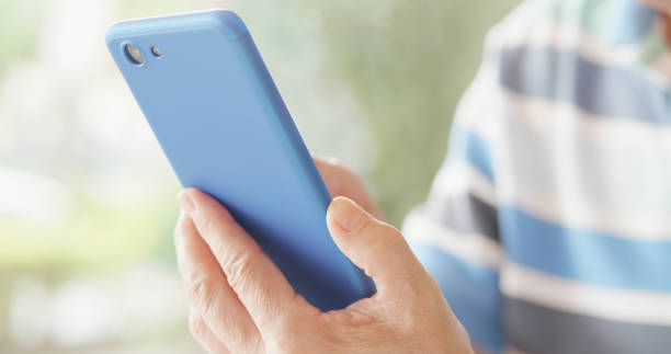 istock elder man use smart phone 1185230310