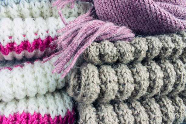 istock Warm knitted scarves in different colors 1185230432