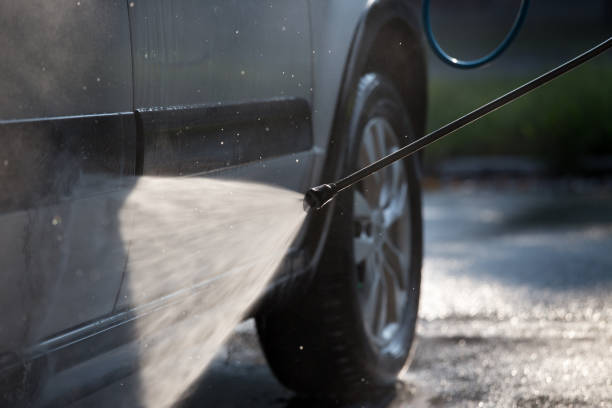 istock Car washing with high pressured water 1185230836