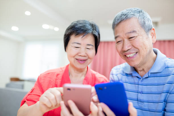 istock asian eldely couple use smartphone 1185231682