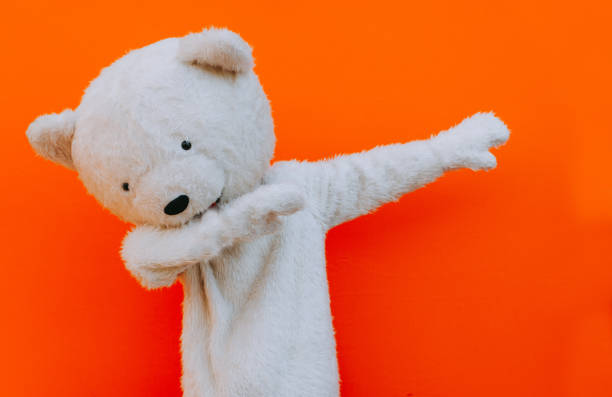 Taxidermy of a Kamchatka brown bear on white background