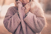Girl wearing warm winter coat outdoors