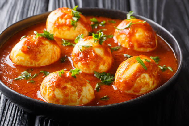 istock Traditional indian curry eggs served in spicy sauce close-up in a plate. horizontal 1185236009