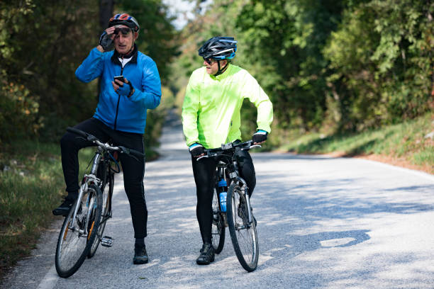 istock Senior Men Cyclers On Country Road 1185236451