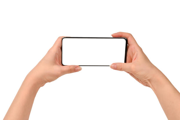 istock Smart phone in woman hands isolated on white background.  White screen. Copy space. 1185236572