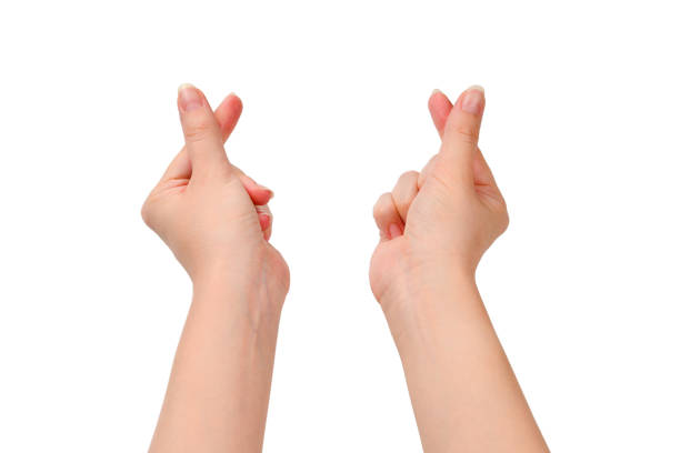 istock Woman hands isolated on white. Heart symbol. 1185236583