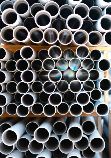 istock Stack of pvc pipes, tubes in an abstract pattern of circles 1185239011
