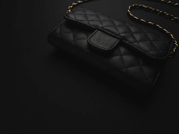 istock Black leather bag with golden chain 1185239097