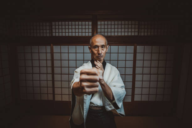 Senior martial art master in his dojo