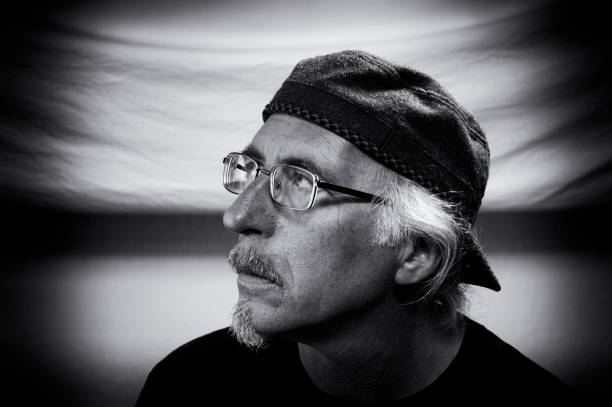 istock black and white profile of man with glasses looking left 1185241856