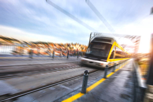 istock Metro train passes on a long suspended bridge 1185242293