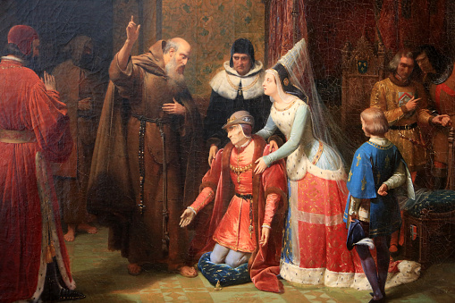 France. Auvergne-Rhône-Alpes. Allier. Moulins. June, 3, 2016. This colorful image depicts a painting of Louis XI at the foot of St. Francis de Paule with Anne de Beajeu and Jacques Coictier, doctor. Nicolas Gosse. Oil on canvas. 1843. Museum of the Visitation.
