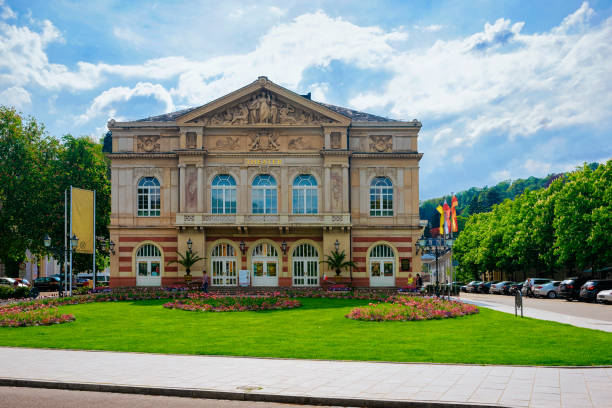 Baden Baden, Germany - May 6, 2013: Theater on Goetheplatz square at Old city of Baden Baden in Baden Wurttemberg region in Germany. Cityscape view of street at Bath and spa German town in Europe