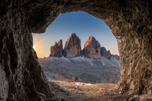 istock Stunning view to Tre Cime di Lavaredo from cave at sunrise 1185249635