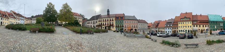 Stolpen, Germany - October, 4 - 2019: Town square with typical houses and cobblestone street.