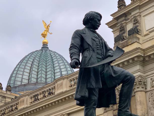 Dresden, Germany - October, 5 - 2019: The Gottfried Semper monument is a memorial in Dresden in memory of the architect and university teacher Gottfried Semper (1803-1879), as his most famous and most important work in the Saxon capital of the state is named after him Semper opera house. The monument stands in the northeast of the inner city district on the Brühl Terrace, a relic of the Dresden fortifications. Directly below him is the entrance to the Museum Festung Dresden.
