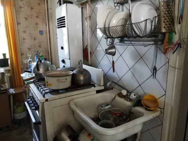 istock mess and dump. An old room with lots of things. Devastation. Very small housing 1185257047