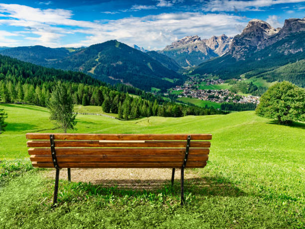 istock Bench for enjoying amzing panoramic view of dolomites in summer 1185259321