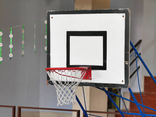 istock basketball hoop school indoor gym 1185259489