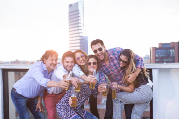 istock Coworkers drinking beer during a relaxing moment in the office 1185260584