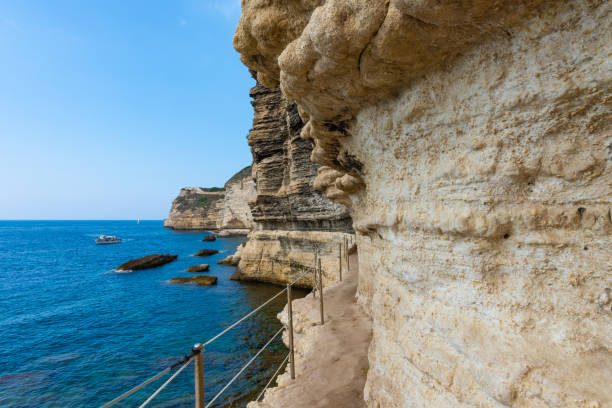 istock Pathway dug out of the cliff underneath Bonifacio, Corsica 1185263522