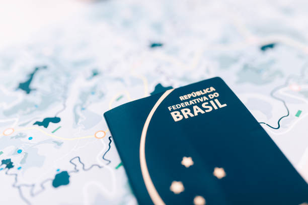 Brazilian passport over tourism map