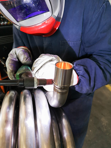 Manual tig welding in an engineering industry.