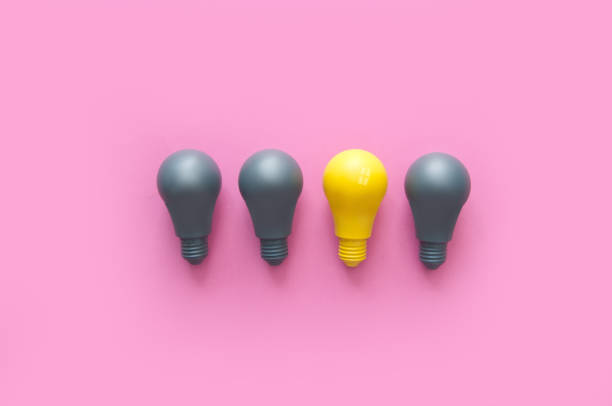 istock Yellow bulb amongst gray 1185266223