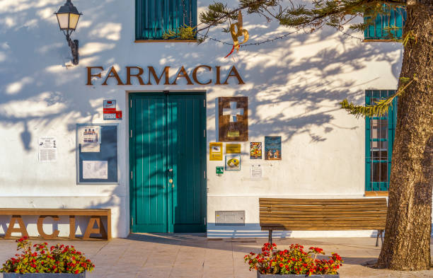 Frigiliana Drugstore or Pharmacy in Spanish The drugstore is located in the Spanish town Frigiliana close to Costa del Sol in Southern Spain. This town is one of the most visited places due to its well kept white houses and streets. The Thursday market attracts numerous visitors. farmacia stock pictures, royalty-free photos & images