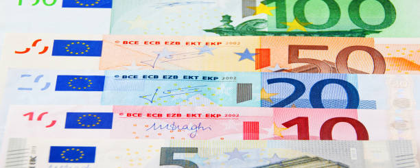 istock Euro cash as background banner 1185269360