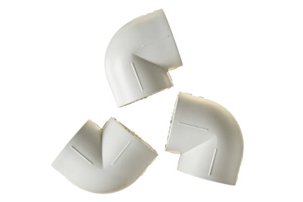 istock Three polypropylene, plastic corners of 90 degree for connecting pipe for water or other liquid for heating room isolated on white background without shadow. Close-up 1185274095