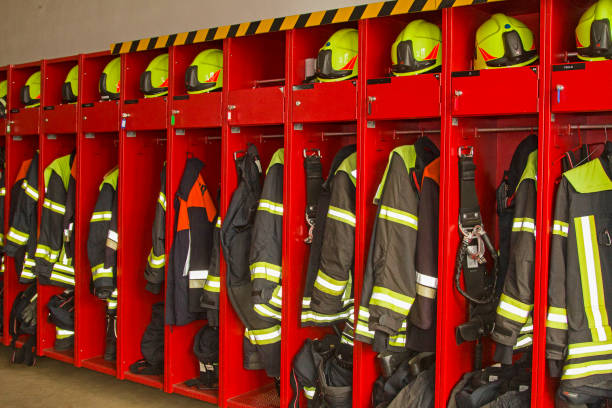 equipment locker of a fire station A look into the neatly organized and well-organized clothing and equipment locker of a fire station fire station stock pictures, royalty-free photos & images
