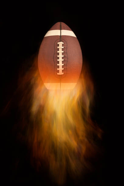 istock American football with fire 1185275429