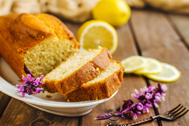 istock Lemon pound cake on rustic wooden background with lemon. 1185276925