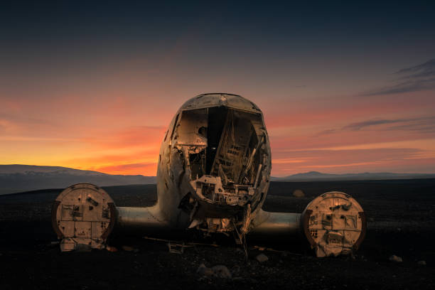istock Airplane wreck in black sand beach in Iceland. 1185282161