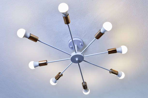istock White chandelier made of painted aluminum. 1185284015