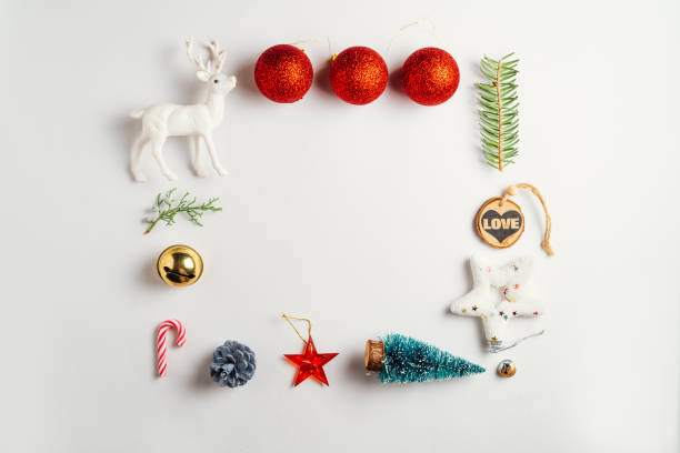 istock Christmas frame holiday background with decorations and ornaments on white table. Top view from above. Flat lay. 1185284503