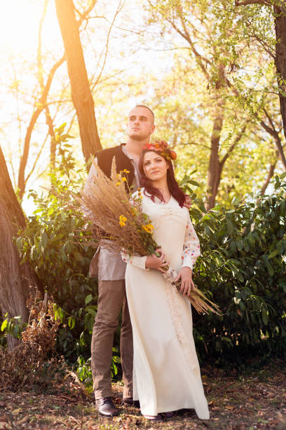 istock Young couple traditional wedding clothes concept 1185287502