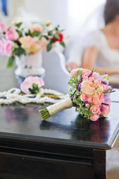 istock wedding bouquet of pink and white roses 1185291890