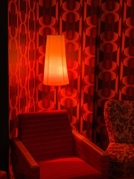 istock Red 50ies chair, lamp and typical wallpaper 1185292313