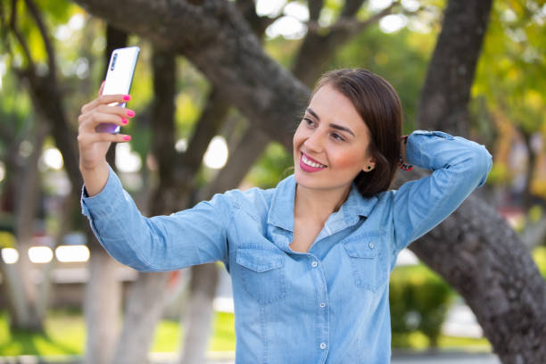 istock Woman with her cellphone 1185292422