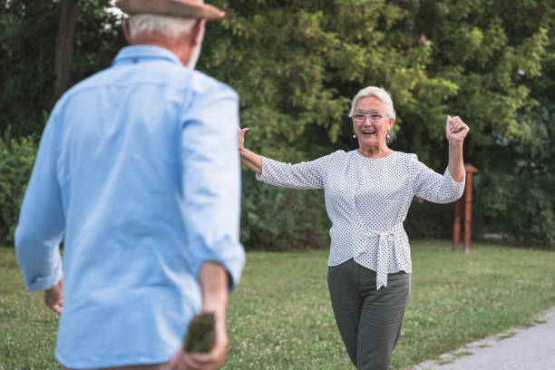 istock Happy woman rushing towards a man 1185293753