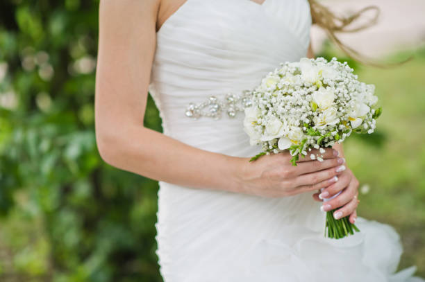 istock wedding bouquet of white roses. 1185294867